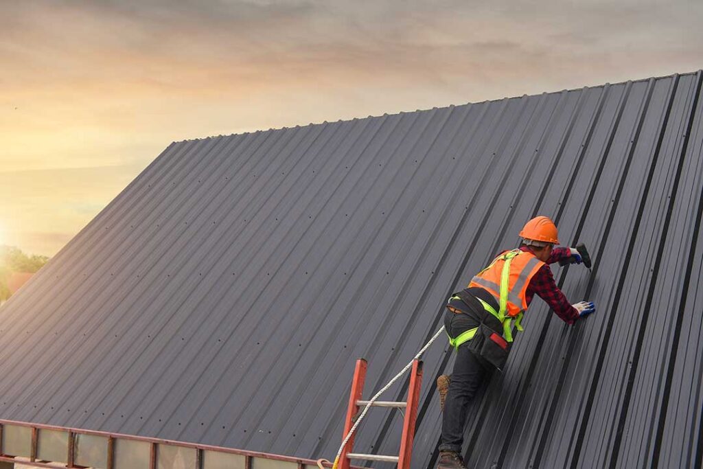 Roof inspector examining curled shingles and worn flashing on a two-story home.